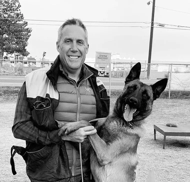 Expert dog trainer Sean Miller in Denver, CO with Malinois